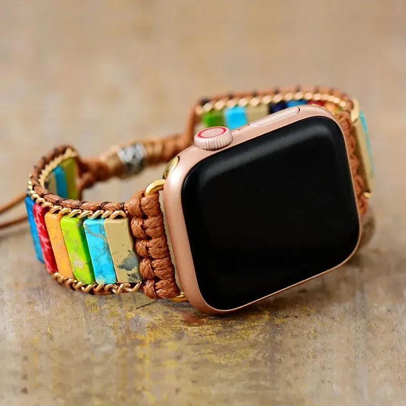 Chakra Jasper Apple iWatch band with colorful rectangular beads and brown woven cord, promoting balance and calm.
