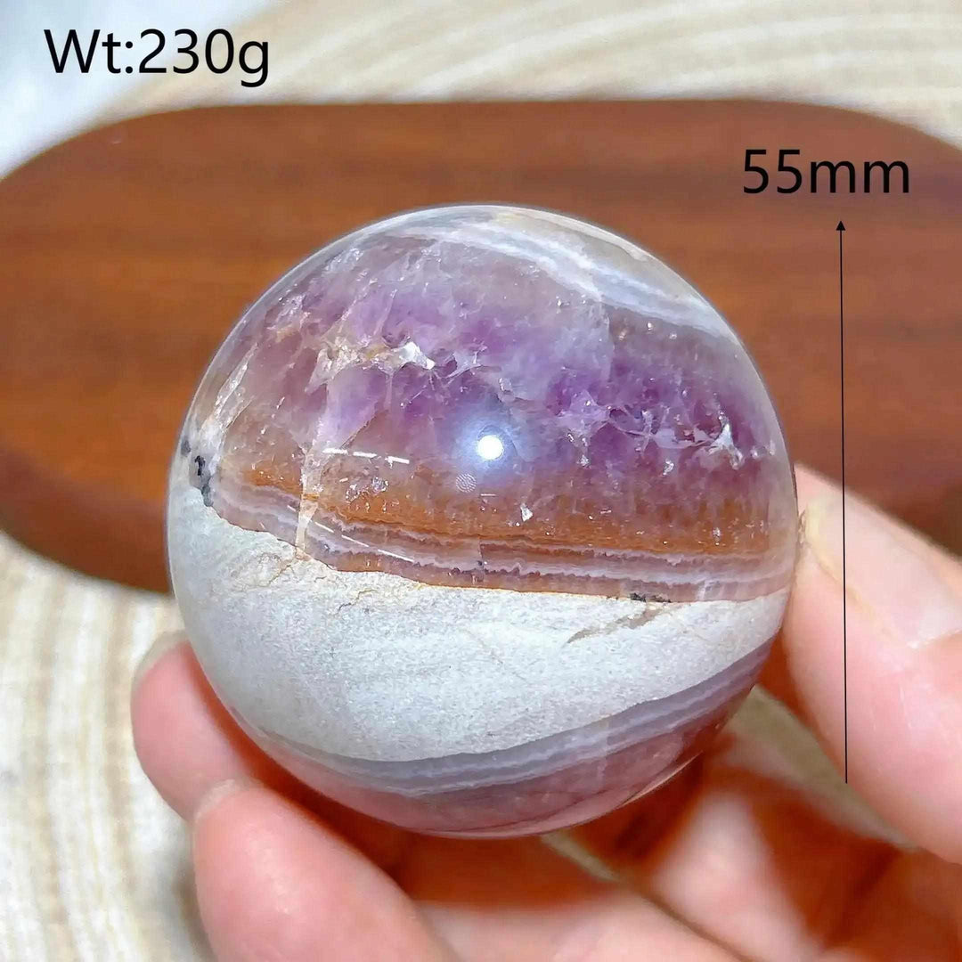 Hand-polished 55mm Amethyst Agate sphere featuring purple amethyst with white, gray, and brown banded agate for meditation.