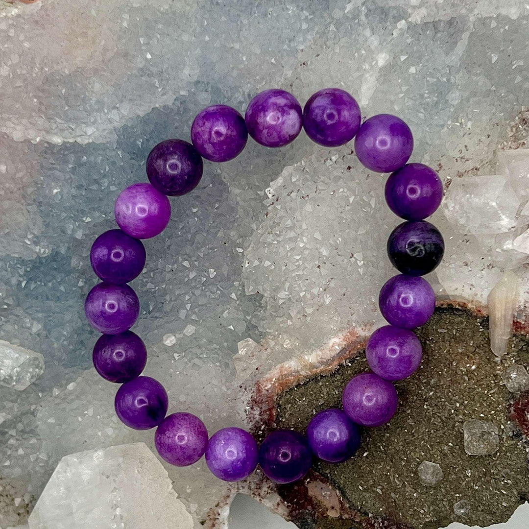 Amethyst Beaded Bracelet with soothing purple gemstones for emotional balance and stress relief.