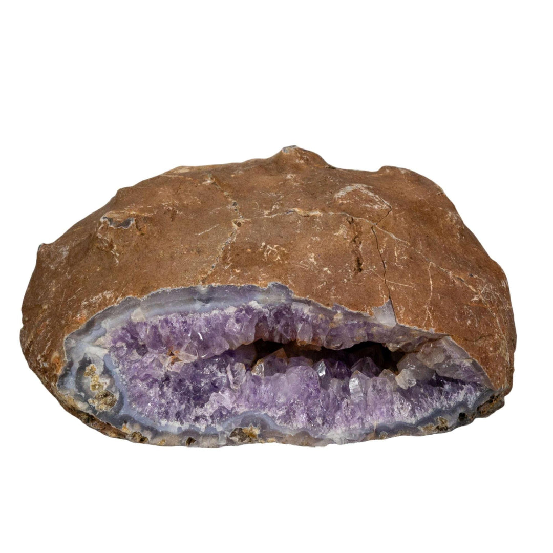 Amethyst Geode Cavern showcasing deep violet to lilac crystals in a natural, hollow, resonant form.