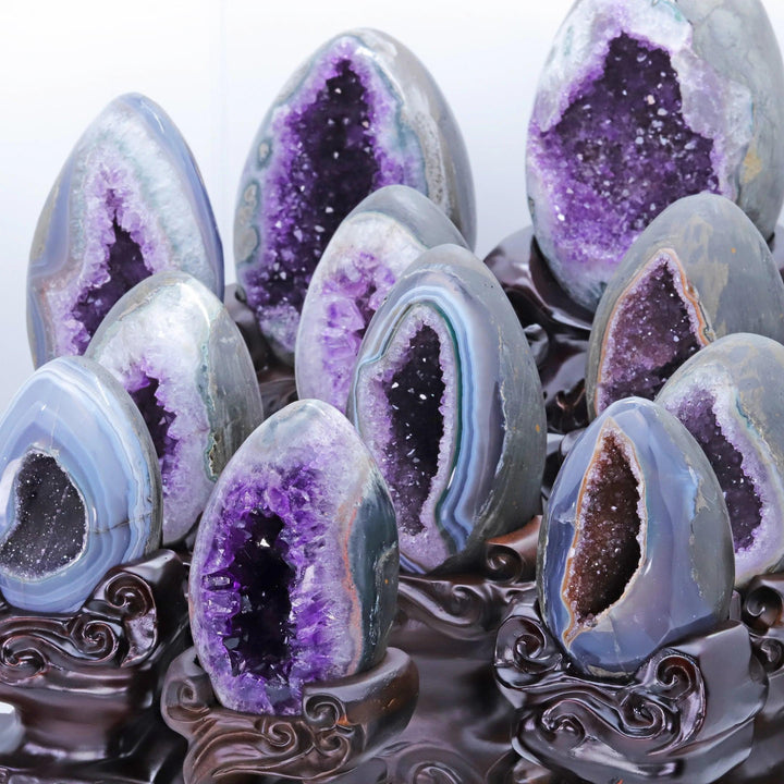 Amethyst Crystal Natural Geode Statement Piece with deep violet clusters on dark wood stands, promoting peace and protection.