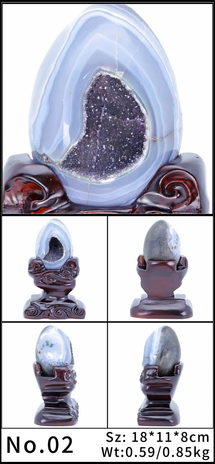 Stunning natural amethyst geode with deep violet crystals, raw and unpolished, displayed on a dark wooden stand.