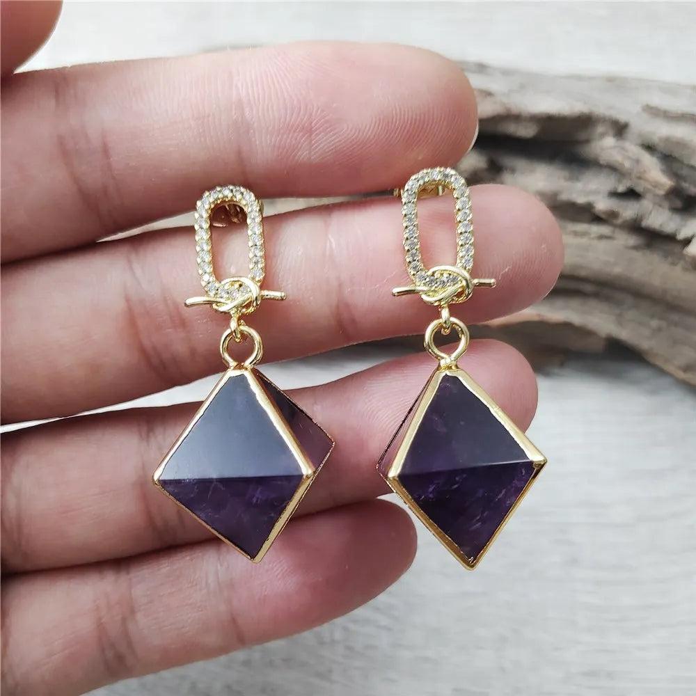 Amethyst Crystal Octahedral Drop Earrings: Gold-plated, deep purple amethyst octahedrons with sparkling zircon accents.