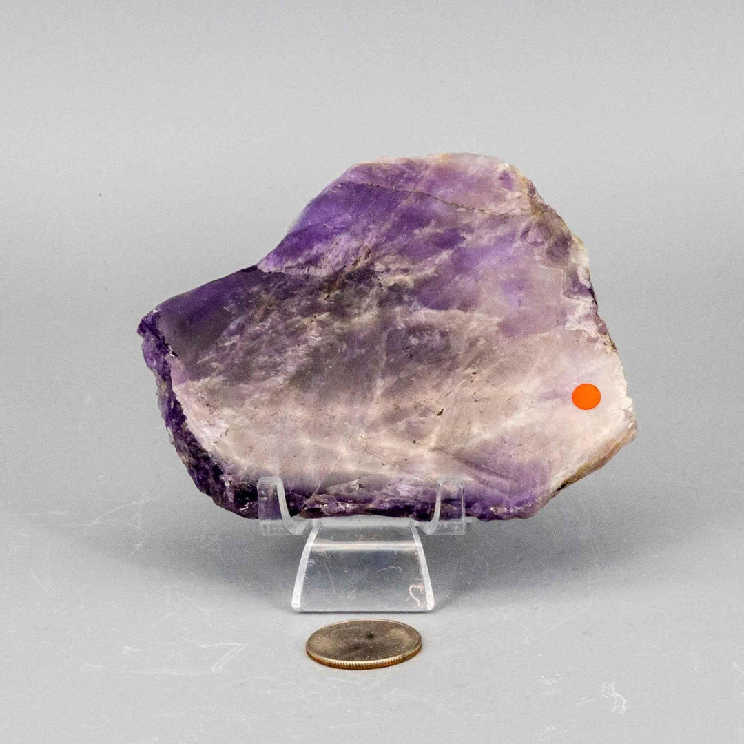 Polished Amethyst Slice, revealing deep violet to light lavender crystalline structure and natural exterior.