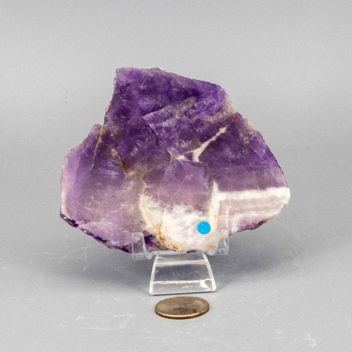 Polished Amethyst Slice, revealing deep violet to lavender crystalline structure with natural edges.