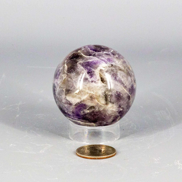 Stunning Amethyst Sphere, 45-72mm, radiating deep purple and pale lavender for calm and spiritual clarity.