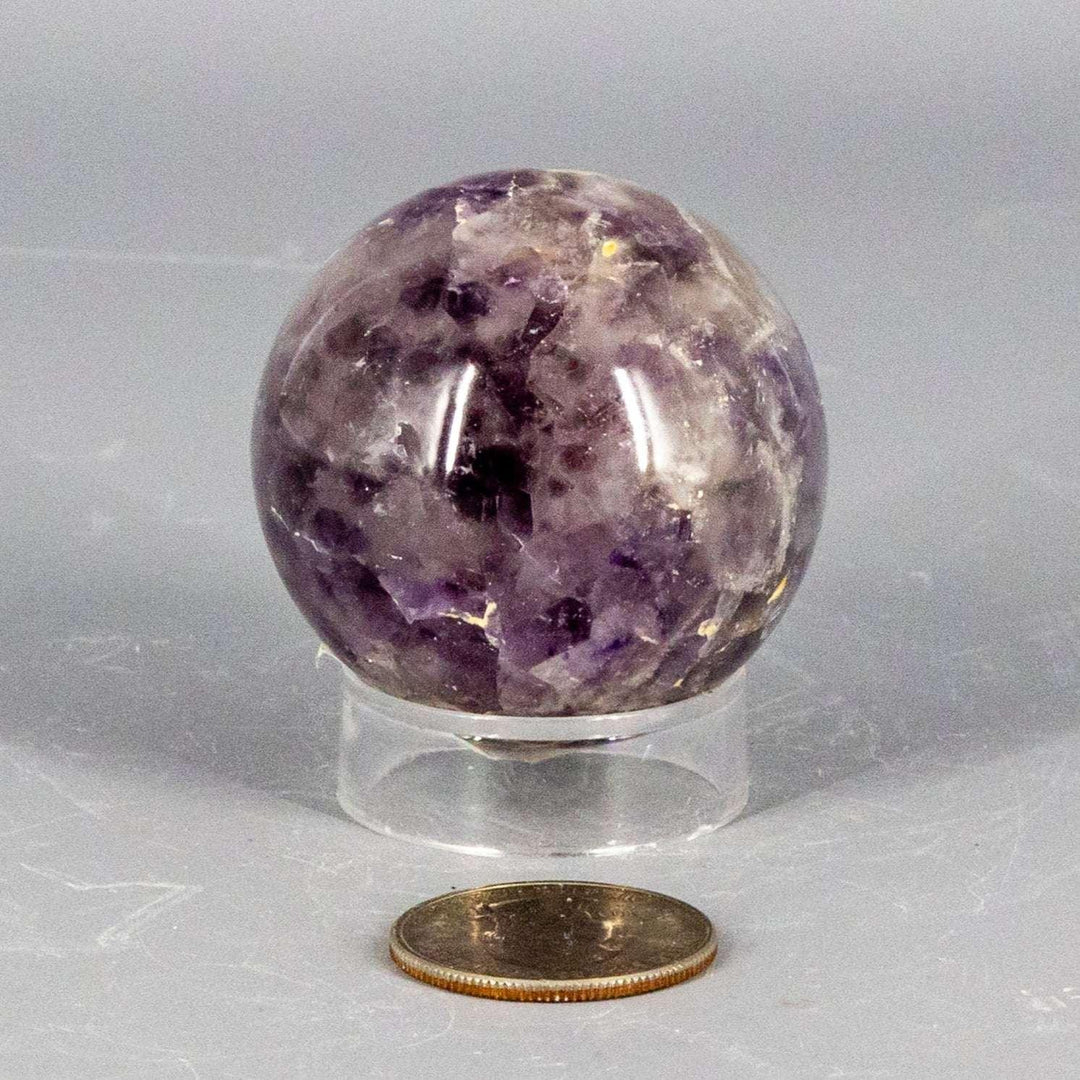 Stunning Amethyst Sphere, 45-72mm, showcasing deep purple hues for calm, spiritual clarity, and protection.