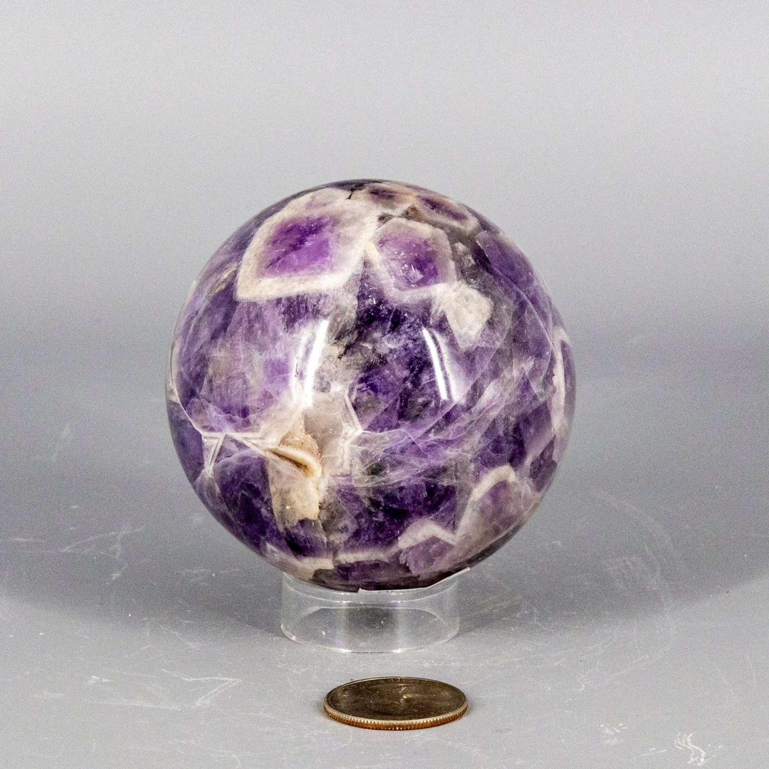 Stunning Amethyst Sphere, 45-72mm, showcasing deep purple hues for calm, clarity, and protection.
