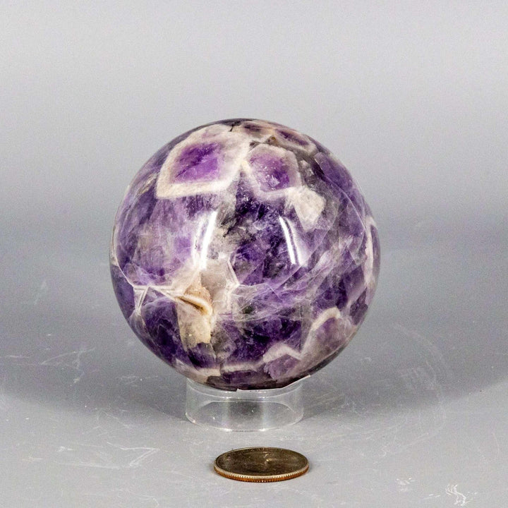 Stunning Amethyst Sphere, 45-72mm, showcasing deep purple hues for calm, clarity, and protection.