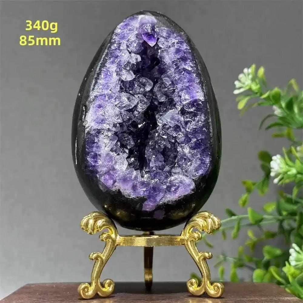 Amethyst geode dinosaur egg with sparkling purple crystals for Crown Chakra healing and peaceful meditation.