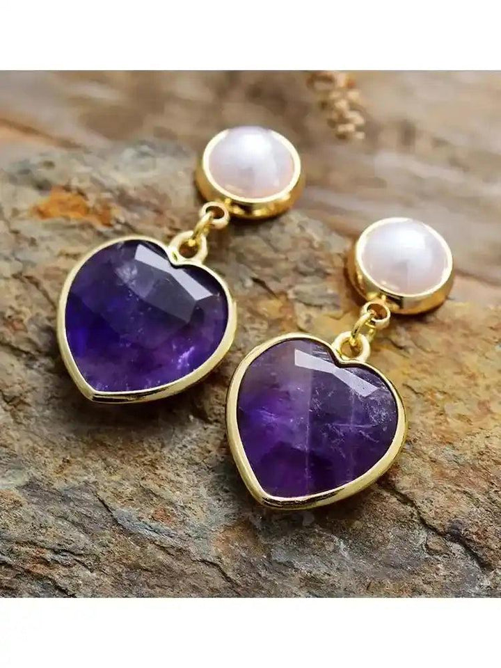 Amethyst Heart Stud Earrings with pearl tops, offering calm and spiritual clarity.