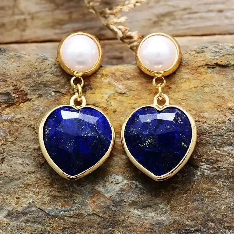Lapis Lazuli Heart Stud Earrings with white pearl tops and gold settings, offering spiritual clarity and deep intuition.