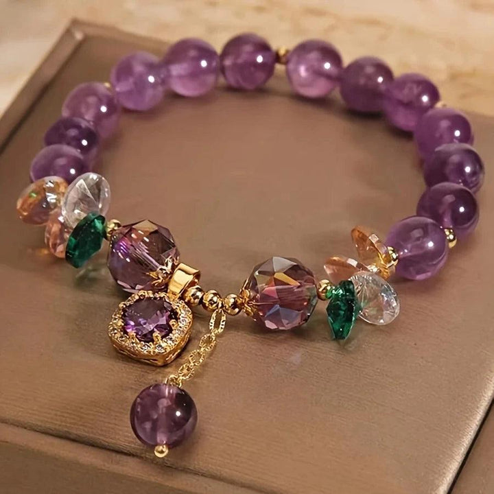 Amethyst Natural Stone Bead Bracelet for Calm and Healing, featuring deep purple beads and sparkling crystal charms.
