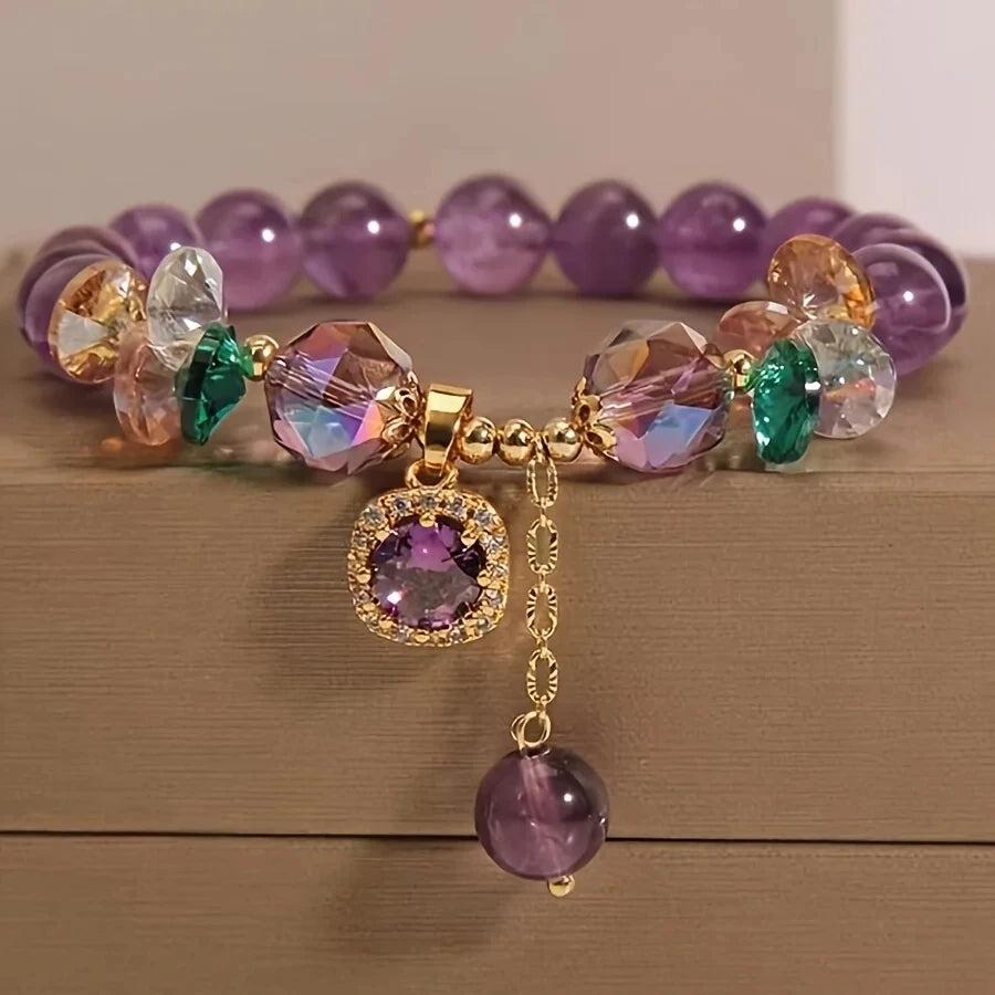 Amethyst Natural Stone Bead Bracelet for Calm and Healing, featuring deep purple beads, faceted crystals, and a gold charm.