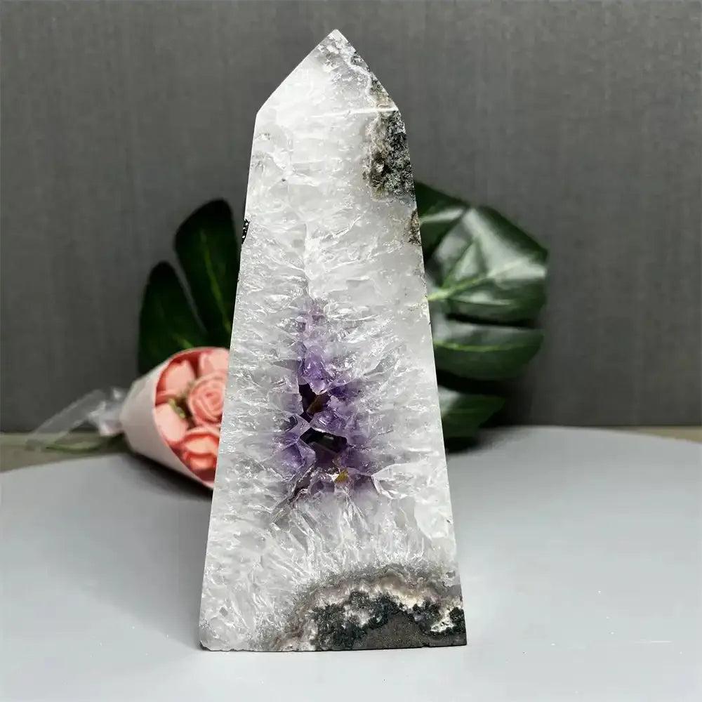 476g Amethyst and Quartz crystal geode tower with a polished pointed top and a stunning purple crown chakra crystal core.