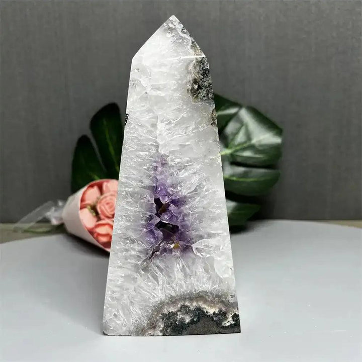 476g Amethyst and Quartz crystal geode tower with a polished pointed top and a stunning purple crown chakra crystal core.
