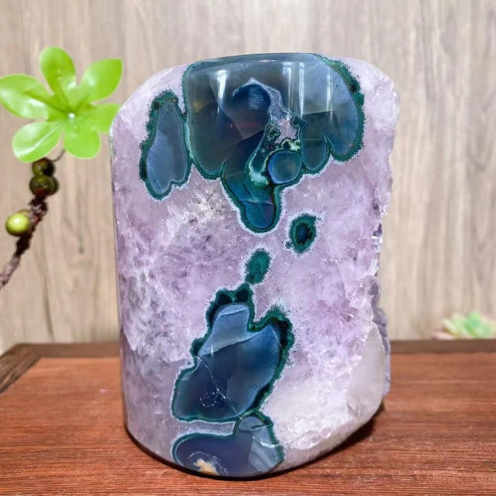 Raw Amethyst and Agate crystal ornament with vibrant purple and deep green patterns for healing home decor.