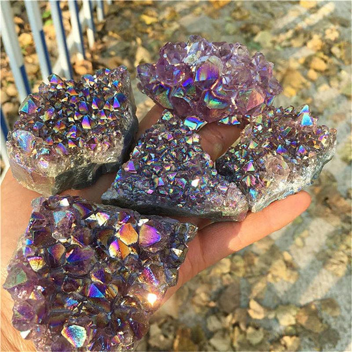 Natural Aura Amethyst crystal cluster with iridescent titanium coating for vibrant rainbow healing and home decor.
