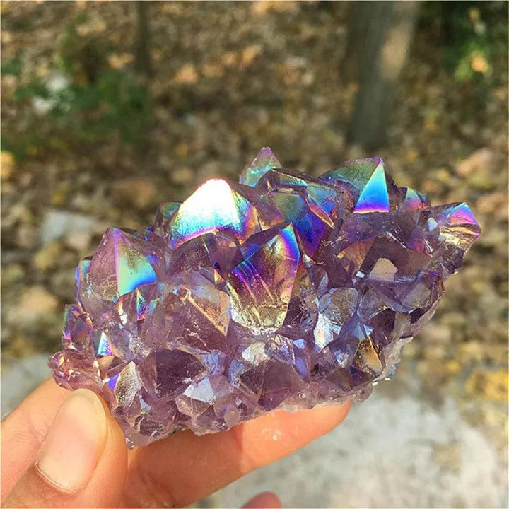 Natural Aura Amethyst crystal cluster with iridescent titanium coating for reiki healing and home decor.