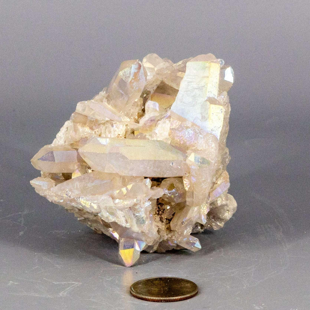 Angel Aura Quartz Crystal Point Cluster Iridescent, a natural clear quartz with permanent platinum and silver bonding, radiating rainbow hues for spiritual elevation.