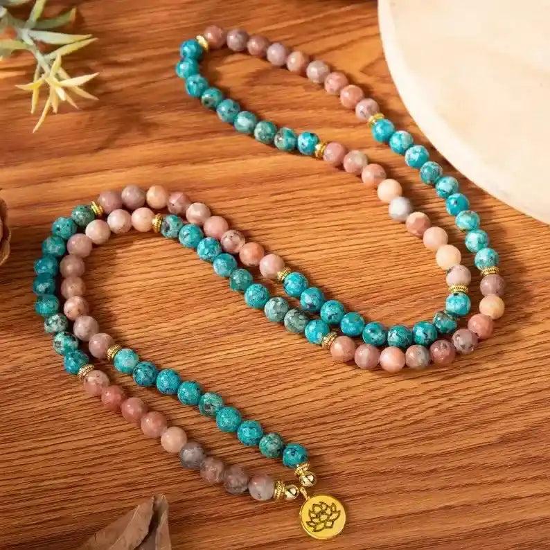 Handcrafted 108 Beads Apatite Mala Bracelet-Necklace with vibrant blue and pink apatite beads, gold accents, and a lotus charm.