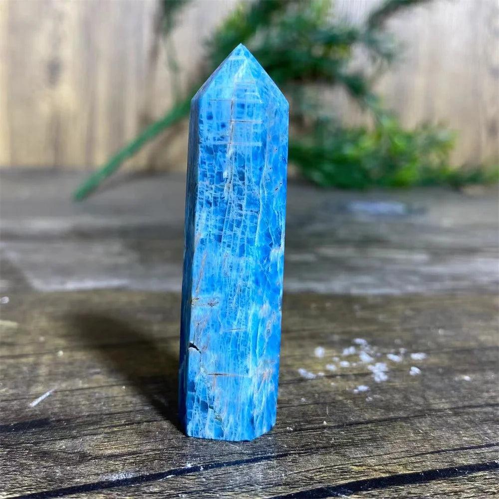 Natural blue Apatite crystal tower wand, a polished healing gemstone point with vibrant color for Reiki and home decor.