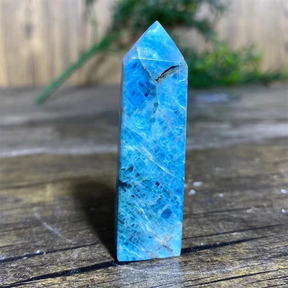 Polished blue Apatite crystal tower wand, a natural healing gemstone specimen for Reiki, meditation, and home decor.