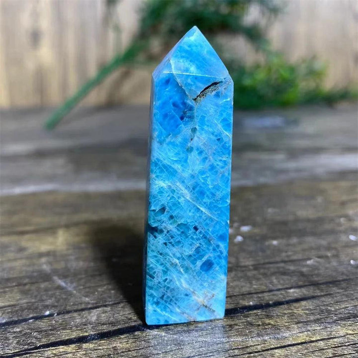 Polished blue Apatite crystal tower wand, a natural healing gemstone specimen for Reiki, meditation, and home decor.