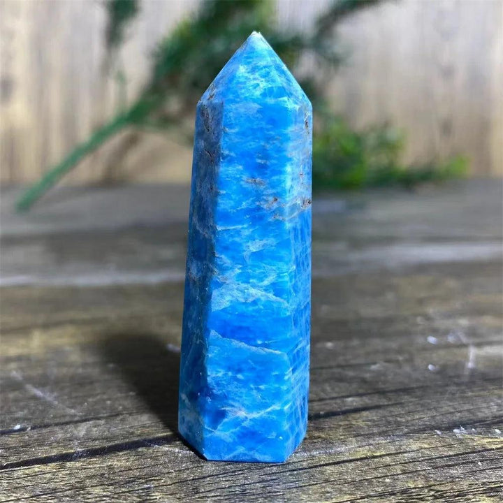 Vibrant blue natural Apatite crystal tower wand, a polished gemstone specimen perfect for Reiki healing and home decor.