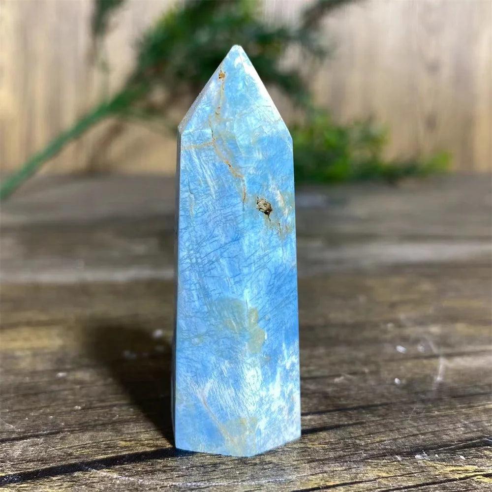 Natural blue apatite crystal tower wand with unique mineral patterns, perfect for Reiki healing and home decor.