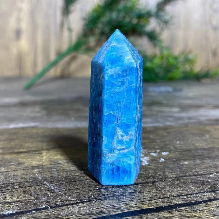 Natural blue apatite crystal tower wand, a polished healing gemstone specimen perfect for Reiki and home decor.