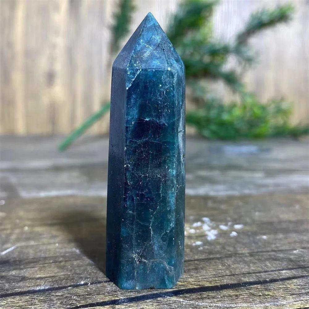 Natural blue apatite crystal tower wand for healing, featuring a deep teal polished gemstone point for Reiki decor.