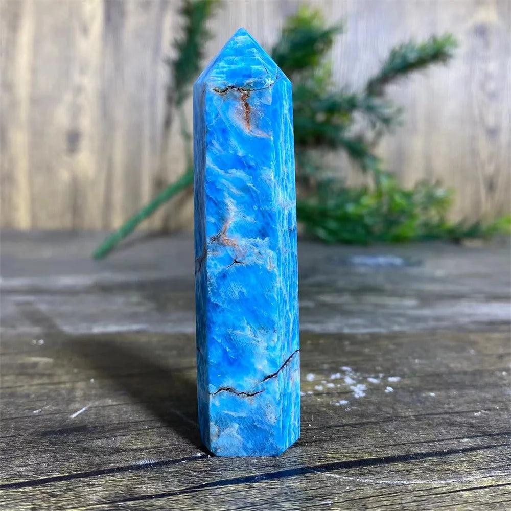 Vibrant blue natural Apatite crystal tower wand, a polished healing gemstone point perfect for Reiki and home decor.