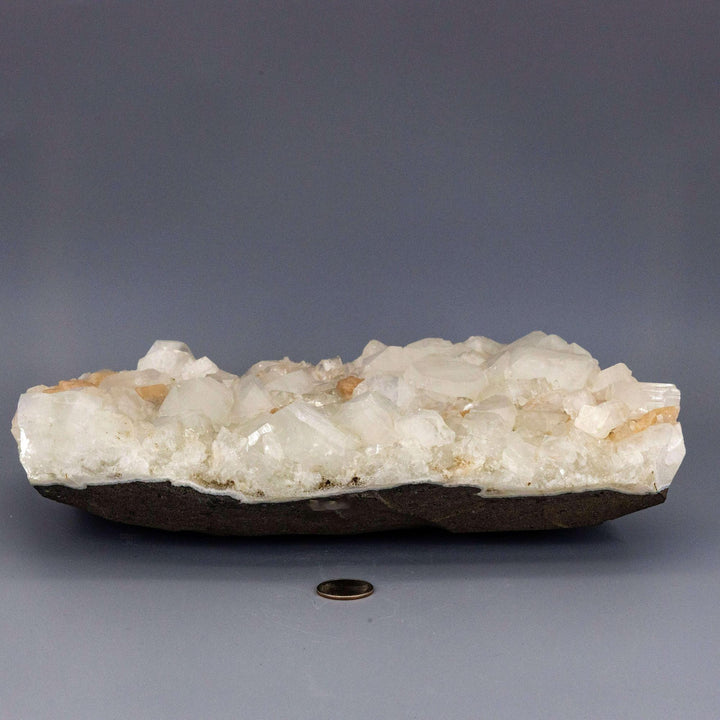 XXL Apophyllite with "peach" Stilbite cluster, featuring tall, clear crystals and soft, peachy-pink formations.