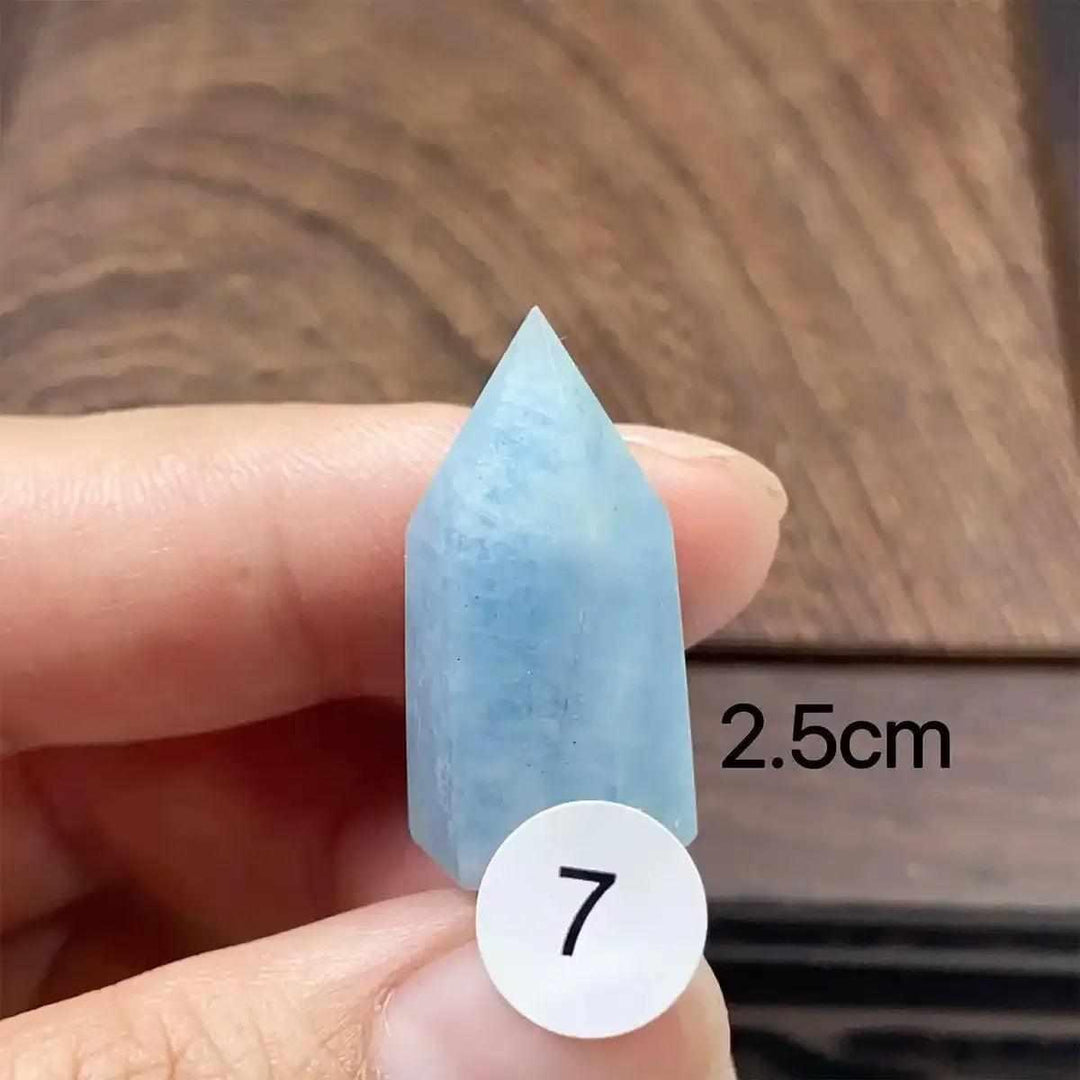 Hand-polished Aquamarine Mini Tower, piece 7, featuring a sea-blue faceted point for calm, clear communication energy.