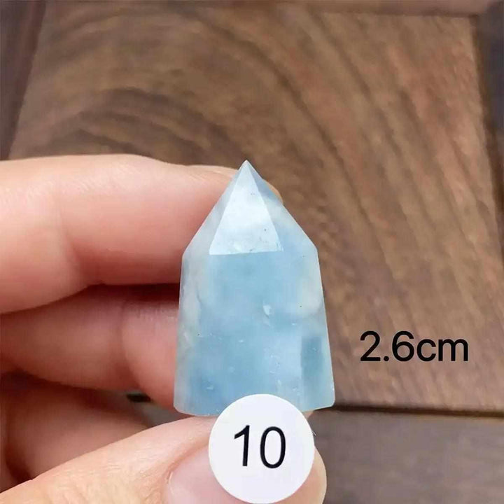 Small Aquamarine Mini Tower with a faceted point, featuring calming sea-blue hues and natural inclusions for meditation.