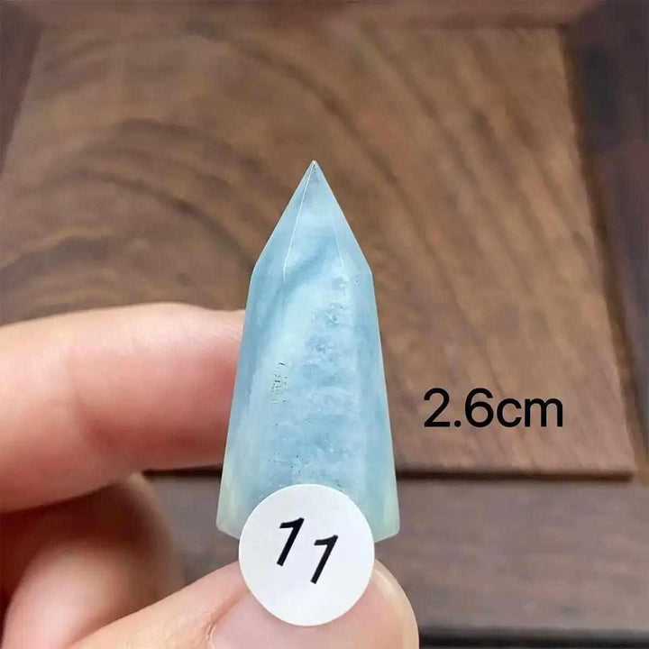 Hand-polished Aquamarine Mini Tower, piece 11, featuring a sea-blue faceted point for calm energy and clear communication.
