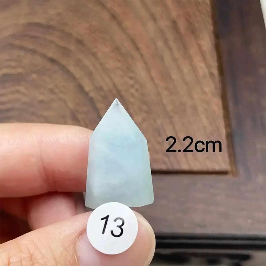 Hand-polished Aquamarine Mini Tower, piece 13, featuring a calming sea-blue faceted point for throat chakra healing.