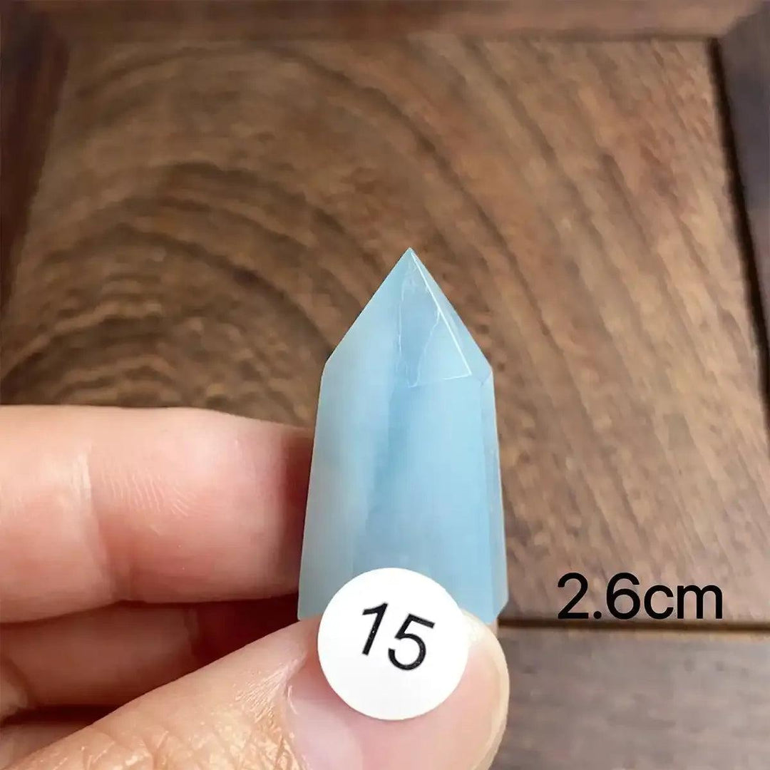 Small Aquamarine Mini Tower with a faceted point, featuring a calming sea-blue color for meditation and clear communication.