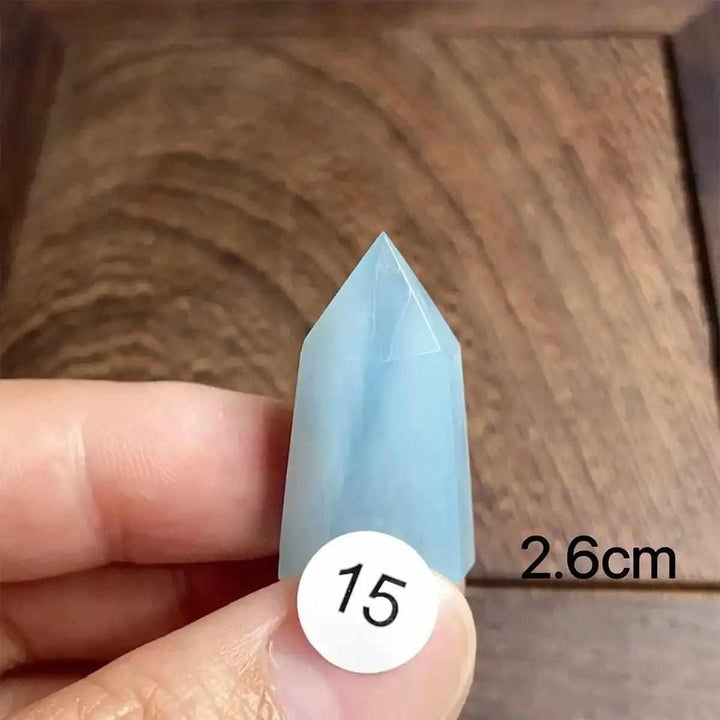 Small Aquamarine Mini Tower with a faceted point, featuring a calming sea-blue color for meditation and clear communication.