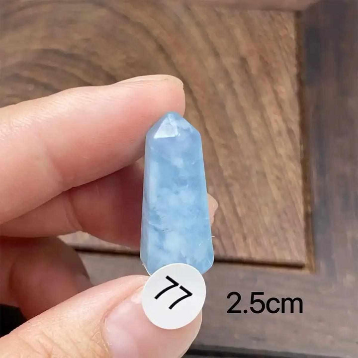 Small Aquamarine Mini Tower with a faceted point, featuring calming sea-blue tones and natural inclusions for meditation.