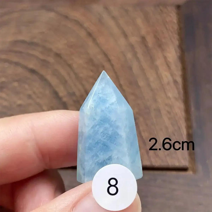 Hand-polished Aquamarine Mini Tower, piece 8, featuring a sea-blue faceted point for calm, clear communication energy.