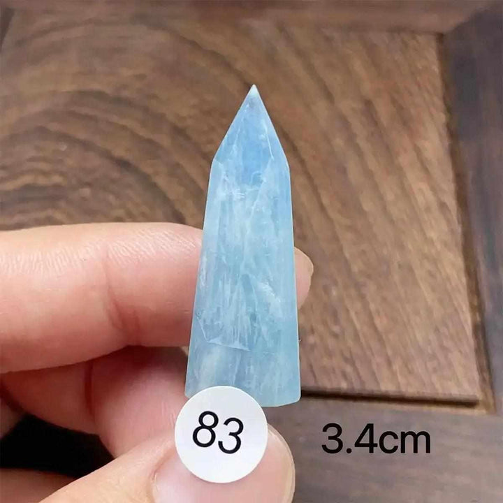 Small Aquamarine Mini Tower, piece 83, featuring a sea-blue faceted point for calm energy and clear communication.