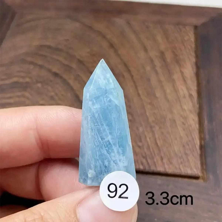 Small Aquamarine Mini Tower with a faceted point, featuring sea-blue hues for calm communication and heart chakra healing.
