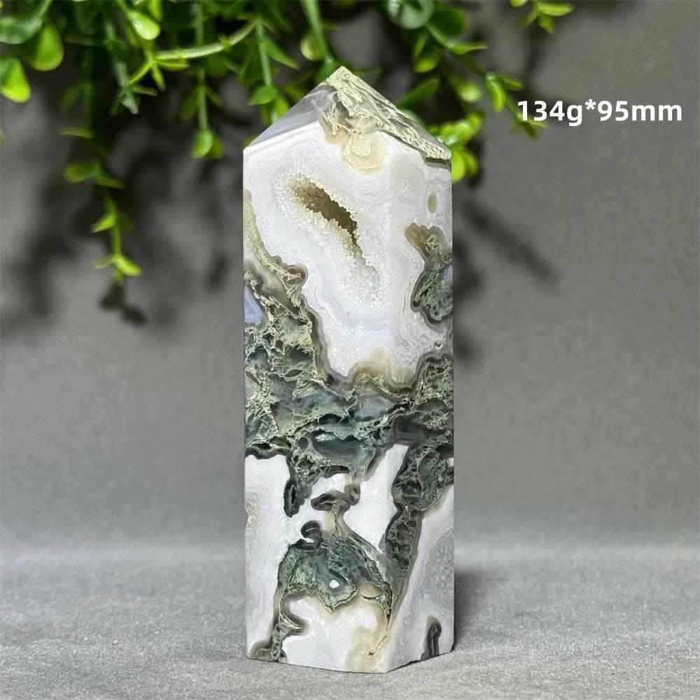 Aquatic Agate Crystal Cave Tower featuring flowing green patterns and a sparkling quartz pocket for calm reflection.