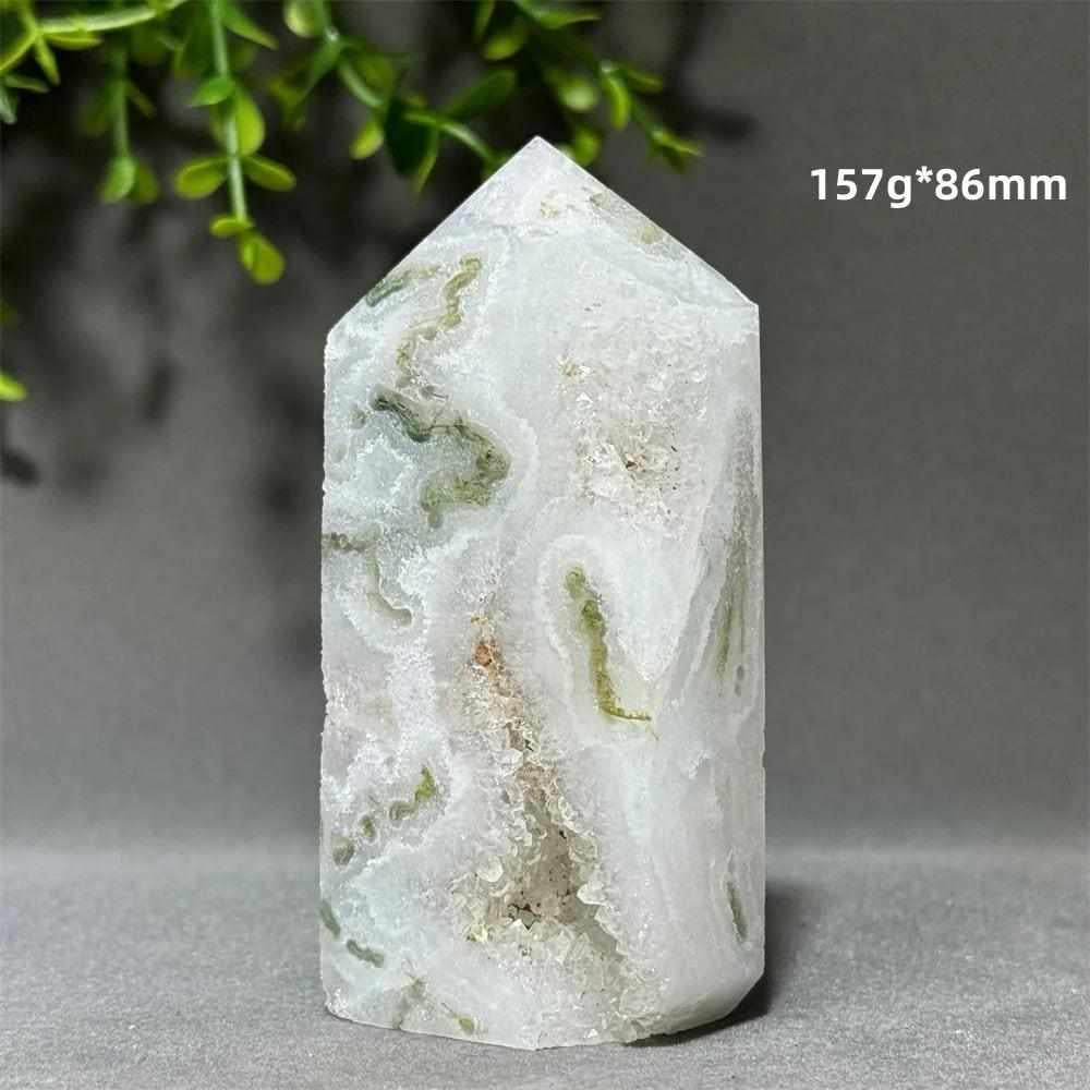 Polished Aquatic Agate crystal tower with a sparkling quartz cave, featuring flowing green patterns for chakra healing.