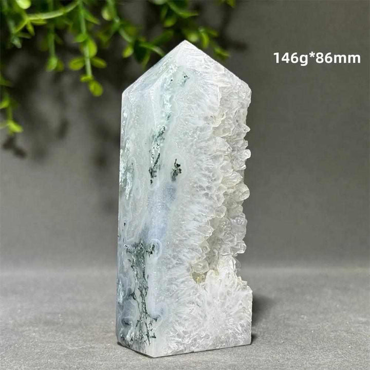 Polished Aquatic Agate Crystal Cave Tower featuring sparkling quartz pockets and calming water-like patterns.