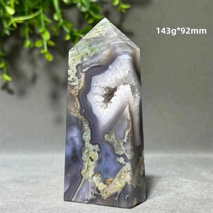 Polished Aquatic Agate Crystal Cave Tower featuring sparkling quartz pockets and calming, water-like patterns.