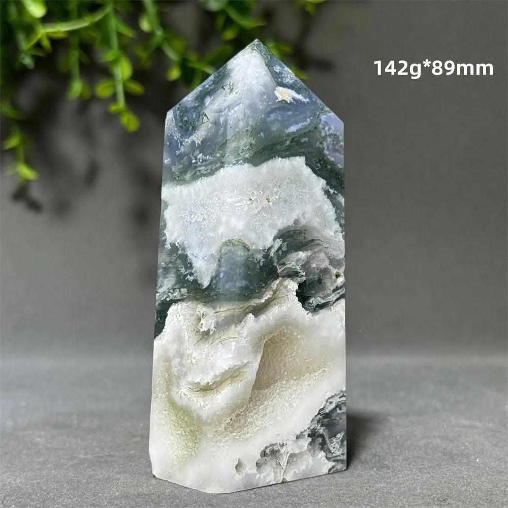Polished Aquatic Agate Crystal Cave Tower featuring flowing blue-green patterns and a sparkling quartz-lined inner pocket.