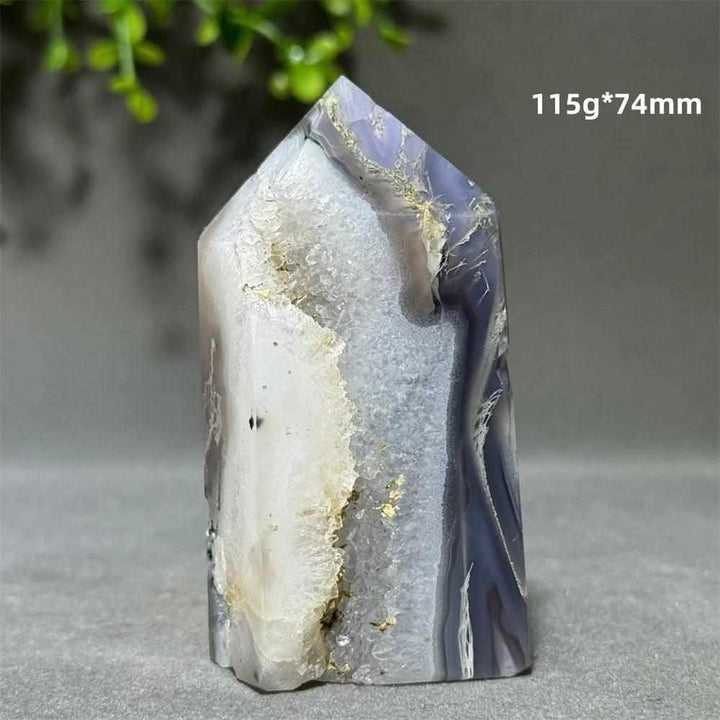 Polished Aquatic Agate Crystal Cave Tower with sparkling quartz pocket and calming blue water-like patterns.